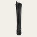 A single black leather equestrian riding boot shown from the back, featuring a full-length center zipper and a small decorative tab on the upper shaft, set against a solid off-white background.