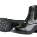 Pair of black leather paddock riding boots, with a front zipper and pull on the back of the boot. Rubber sole with low heal on a white background.