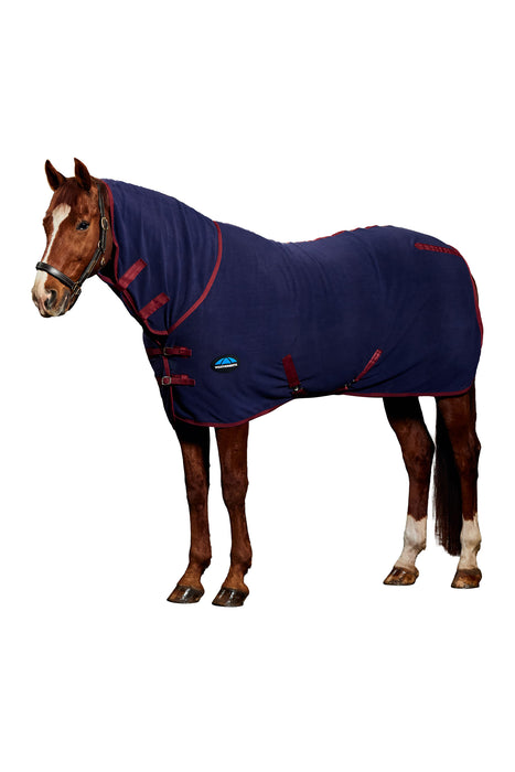 A brown horse wearing a navy blue cooler with burgundy trim and a hood, shown in profile against a plain white background.