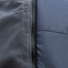 Close-up detail of a dark gray zippered Comfi Guard hood showing a textured fleece fabric on one side and a smooth quilted panel on the other.