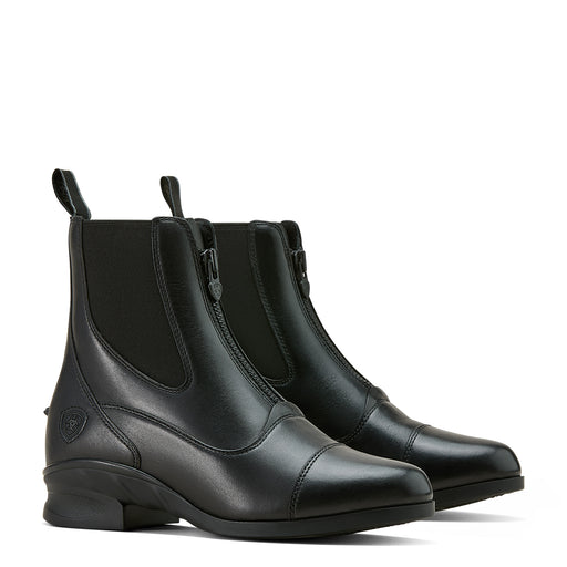 A pair of black leather riding boot with zipper closure and elastic at the ankle on a white background