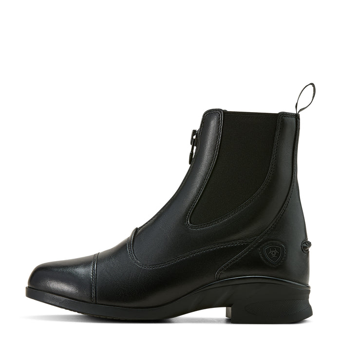 Inside view of black leather riding boot with zipper closure and elastic at the ankle on a white background