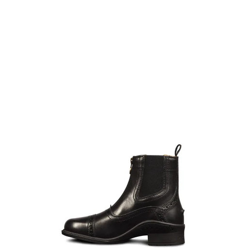 Black paddock riding boot with circle punch detailing on the toe, side gussets, zipper closure and pull tab on the back. Black rubber sole with short heal on a white background.