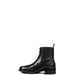 Black paddock riding boot with circle punch detailing on the toe, side gussets, zipper closure and pull tab on the back. Black rubber sole with short heal on a white background.