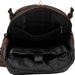 An image of the inside of a backpack featuring a laptop pocket and a upper zipper pouch on the inside. Showcasing an additional zipper on the outside and clip detail on either side. 