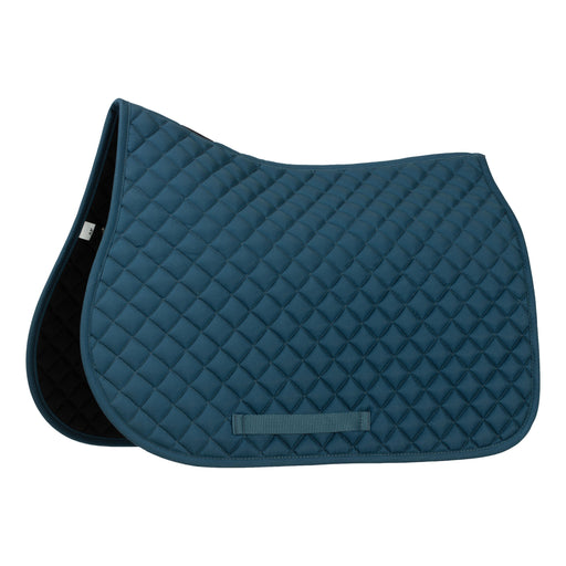 A close up of a blue cotton quilted dressage saddle pad against a white back ground