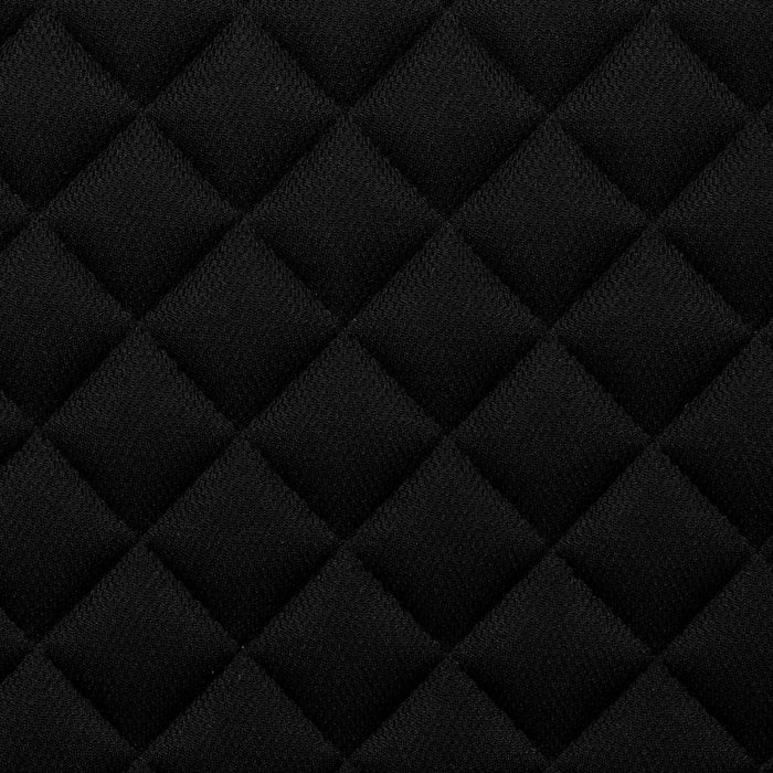 Close up of the quilted saddle pad showing the breathable fabric underside of the dressage pad